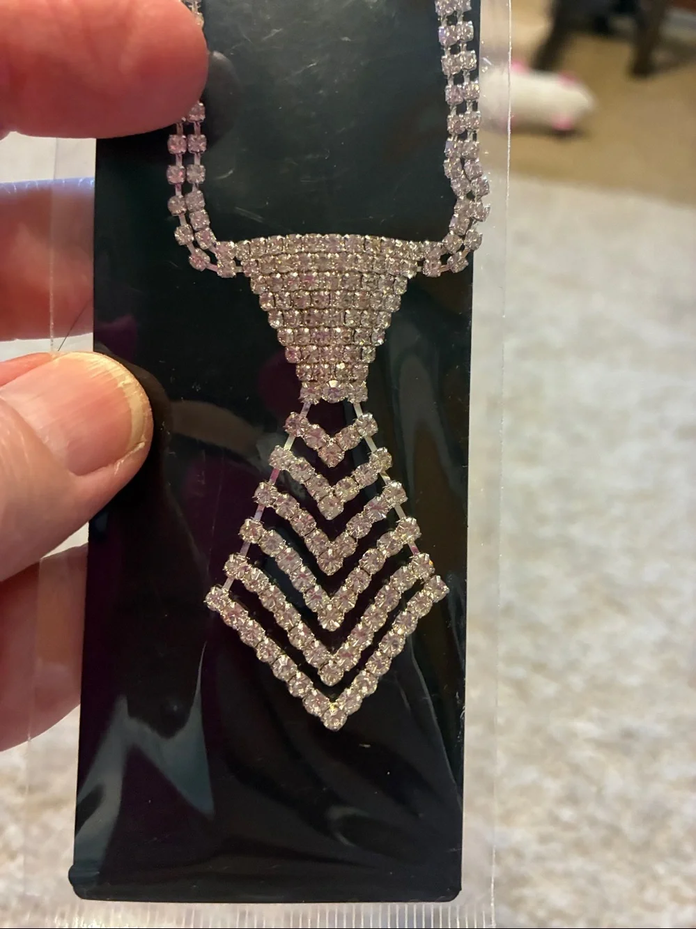 Dog Necklace is full of rhinestones. This necklace is a neck tie NWT